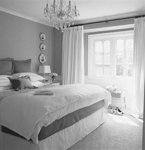 Gray Wall With Glass Windows And White Curtains Combined With White Bed