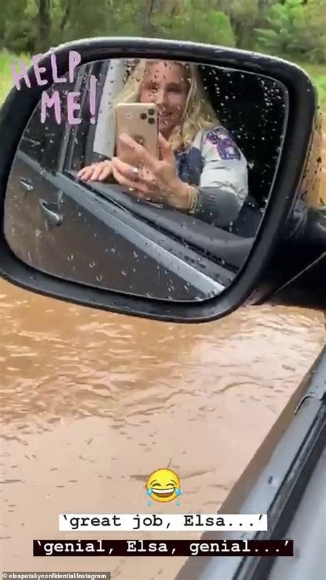 elsa pataky escapes through a car window in flooded byron bay street express digest