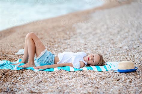 Cute Little Girl At Beach During Summer Vacation 18055399 Stock Photo