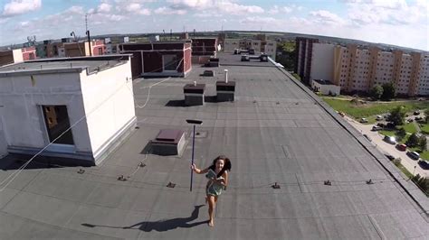 Drone Discovers A Woman Doing Topless On A Roof Youtube