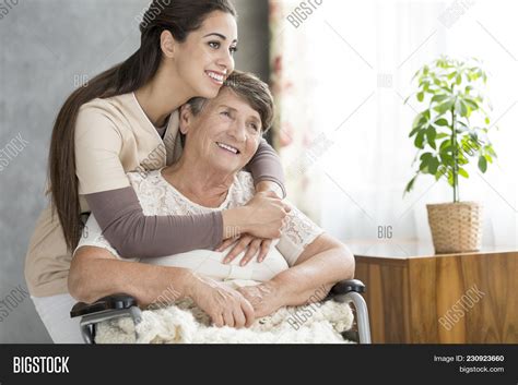 Caring Smiling Woman Image And Photo Free Trial Bigstock