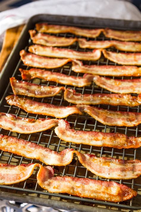 For peppered bacon, grind fresh black pepper (we prefer a course grind) all over the bacon slices before or towards the end of baking.; How To Bake Bacon (NO MESS!!!) - Unsophisticook