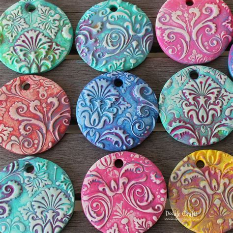 These impossibly cute polymer clay earrings are everywhere right now. Damask Polymer Clay Pendants made with Sculpey