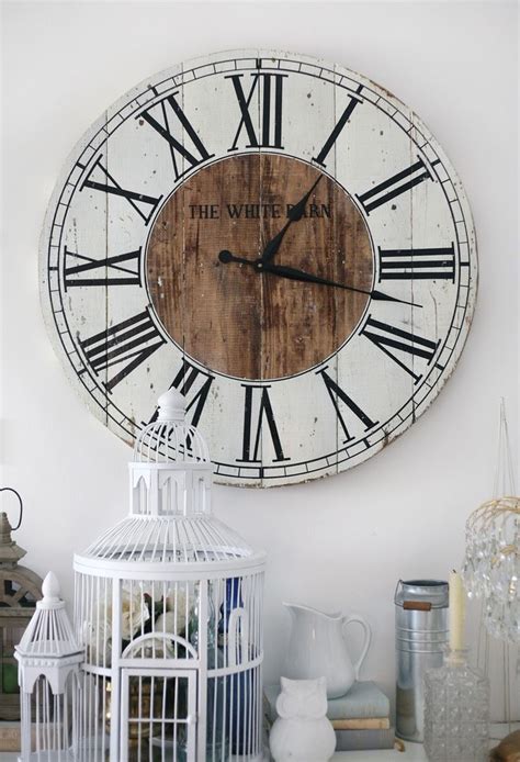 A vintage french wall clock with roman numbers. 40 Pieces of DIY Shabby Chic Decor For Your Home