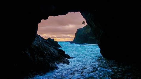 1280x720 Cave Sunset Sea 720p Hd 4k Wallpapers Images