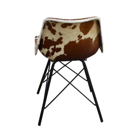 Western chic turquoise and cowhide victorian chair. Eames Stlye Cowhide Chair