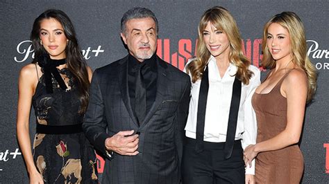 Sylvester Stallone And Jennifer Flavin With Daughters On Crimson Carpet