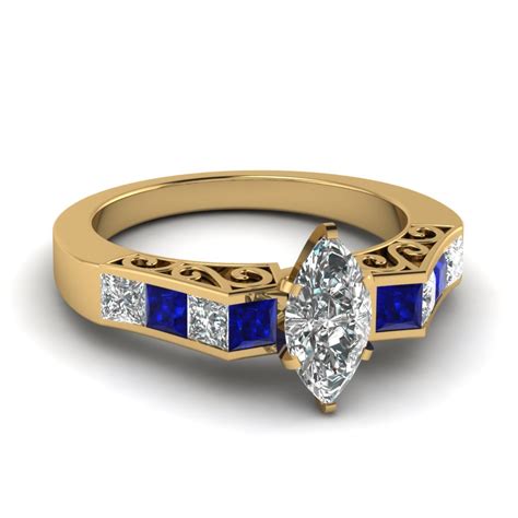 070 Ct Marquise Cut Diamond Channel Set Ring With Blue Sapphire In