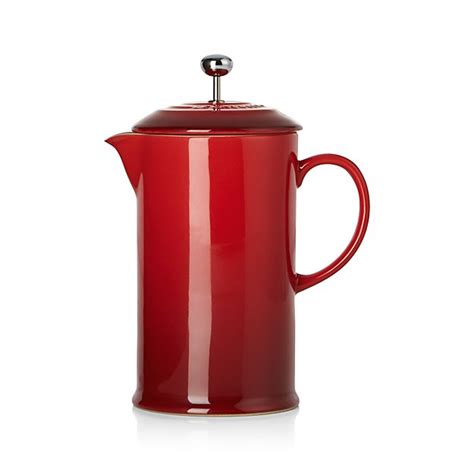 Coarsely ground coffee beans or loose tea leaves are steeped in boiling water, and then filtered away by plunging the mesh sieve through the press. Le Creuset ® Cerise French Press | Crate and Barrel