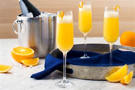To Make This Classic Mimosa Pour Orange Juice Into A Champagne Flute