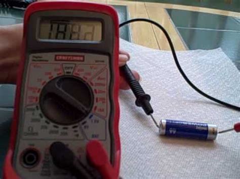The positive and negative terminals on the battery are labeled and easy to spot. Test AA Battery with Multimeter - YouTube