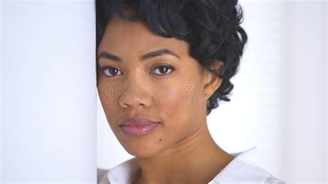 close up of african american woman behind sheer curtains blowing in wind stock video video of