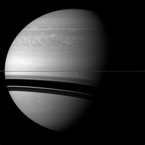 Saturn And Tethys Photo Taken By Nasas Cassini Solstice Mission
