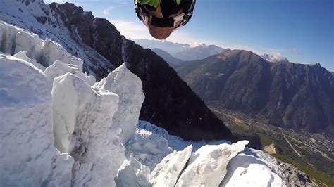 Base Jumper Shoots Through Sky Above Glaciers Youtube