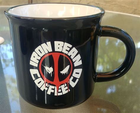 Usmc veteran owned husband & wife hand roasting world class coffee at working class prices. Iron Bean Coffee Camper Mug 20 Oz Deadpool Logo Black ...