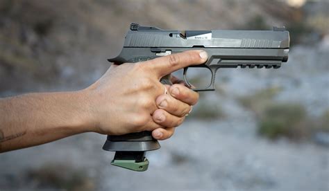 How To Hold A Handgun Guide To Grip