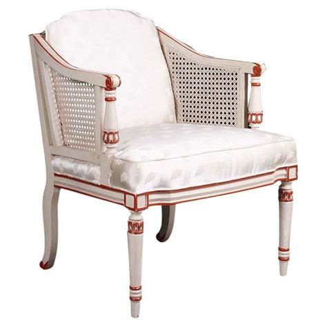 French Louis Xvi Style Bergère Armchair With Distressed Fabric For Sale