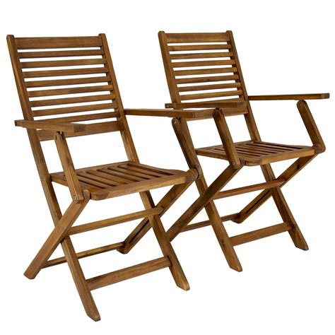 An outdoor wooden chair with folding frame for much easier transportation and storage. Folding Garden Wooden Arm Chairs Pair - savvysurf.co.uk
