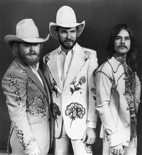 zz top here you can actually see their faces they sing theme song 4 dd sharp dressed men