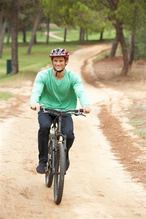 Man Riding Bicycle In Park Stock Image Image Of Full 16826195