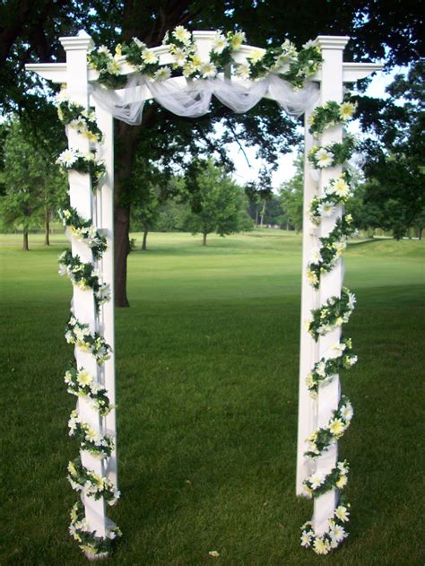 With seasonal flowers, fabrics, and various builds, building a simple, chic rustic arbor yourself. Sutcliffe Floral: Weddings
