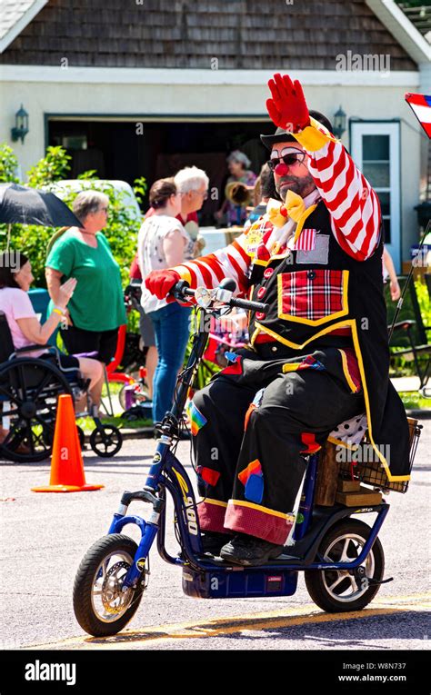 Mendota Minnesotausa July 13 2019 St Paul Osman Shrine Clown On Bicycle Waves To Crowd