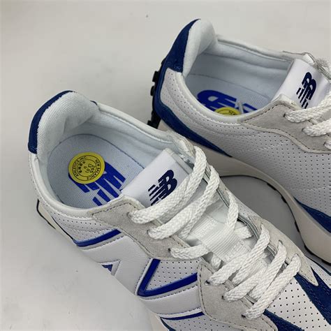 Sustainable style shakes hands with nb heritage in the 327 undyed. New Balance 327 Perforated Pack White Blue For Sale - The ...