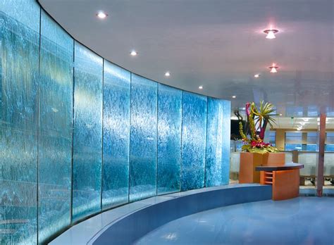 The water flows down on a flood area, e.g. Catlin Insurance Company | Water walls, Glass wall design ...