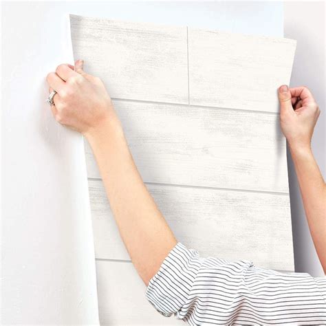 This reclaimed shiplap 18' l x 20.5 w peel and stick wallpaper roll are easy to apply and even easier to remove, all without harming the walls. Magnolia Home Shiplap Wallpaper - Cool White in 2020 ...