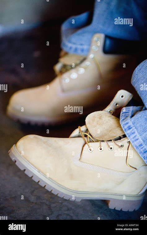 Close Up Of Heavy Boots Being Worn Stock Photo Alamy