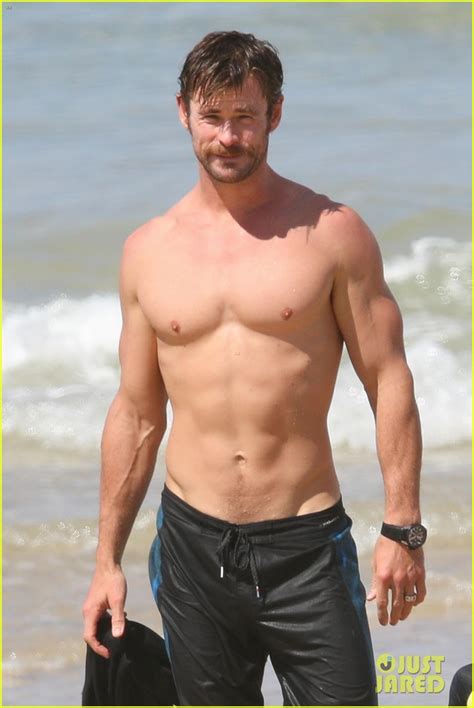 Chris Hemsworth Puts His Ripped Shirtless Body On Display As He Soaks Up The Sunshine Photo