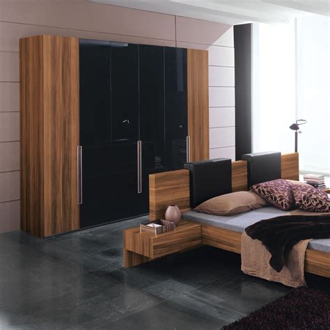 Wardrobe furniture can come with many options for storage, including drawers, cabinets and hanging rods. Bedroom Wardrobe Design | Interior Decorating Idea