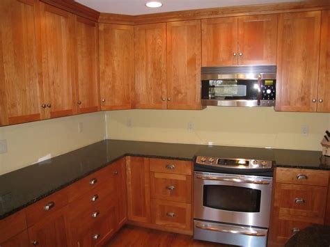 18 posts related to honey oak cabinets granite countertops. uba tuba granite ... | Cherry cabinets kitchen, Kitchen, Kitchen cabinets
