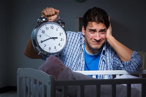 The Young Father Under Stress Due To Baby Crying At Night