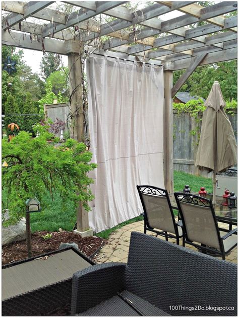 These diy patio curtains from drop cloths are a simple solution for the sun beating down on your patio? DIY - Patio Curtains - 100 Things 2 Do