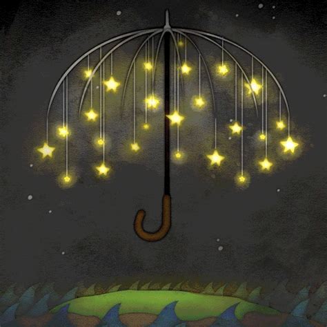 An Umbrella With Stars Hanging From It