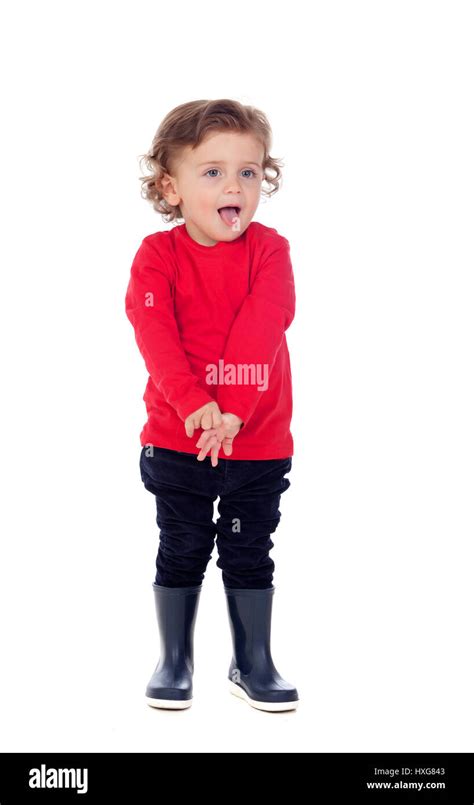 Shy Baby With Two Years Wearing Red T Shirt Isolated On A White