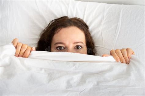 Scared Woman Hiding Under Blanket Stock Image Image Of Morning