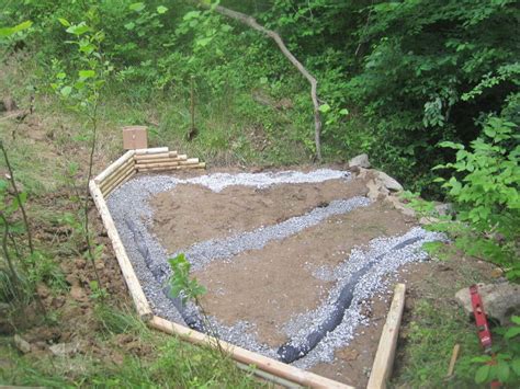 A channel drain is used for a number of areas including within a driveway, at the edge of a patio, walkway, or pool deck. Creating a Creek Stone Patio & Fire Pit | Hometalk