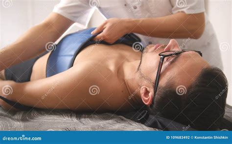 Osteopathic Doctor Perform Procedure Stretching The Spine