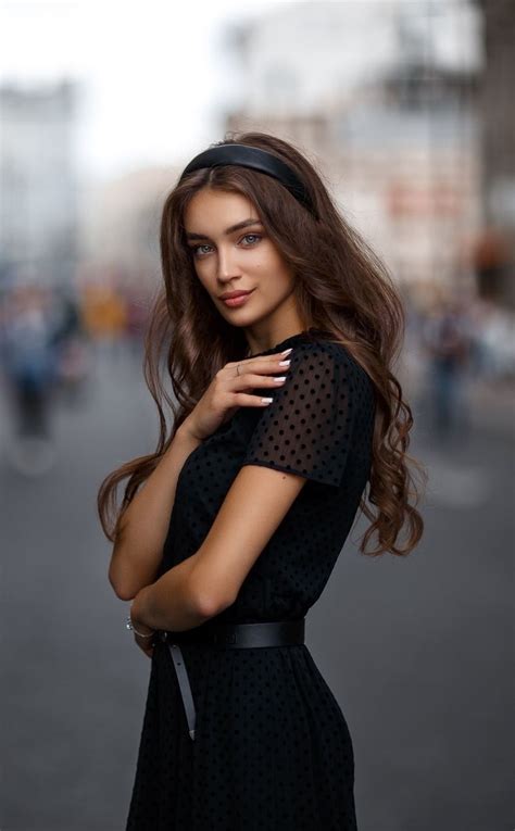 950x1534 Black Dress Pretty Long Hair Woman Model Wallpaper