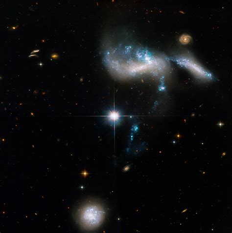Hubble Images Four Merging Dwarf Galaxies Scinews
