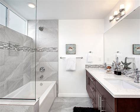 The dark wooden vanity has a granite countertop. Medium Sized Contemporary Family Bathroom Design Ideas ...