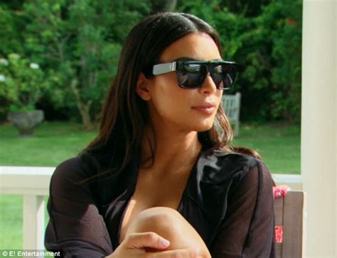 Khloe Kardashian Showcases Slim Legs In Golden Dressing Gown After
