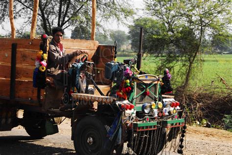 Photo of Man Driving a Jugaad by Photo Stock Source transportation ...