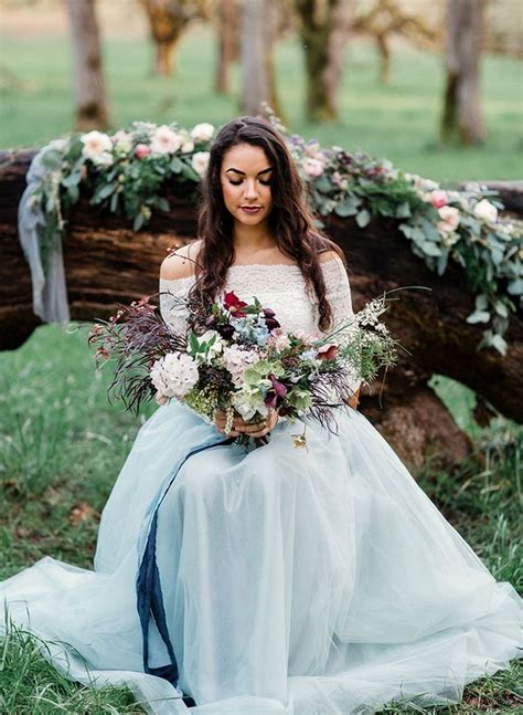 Places you might want to consider for dress rentals include borrowing magnolia, preownedweddingdresses.com, and rent the runway. Moody Berry & Blue Wedding Inspiration | Blue wedding ...