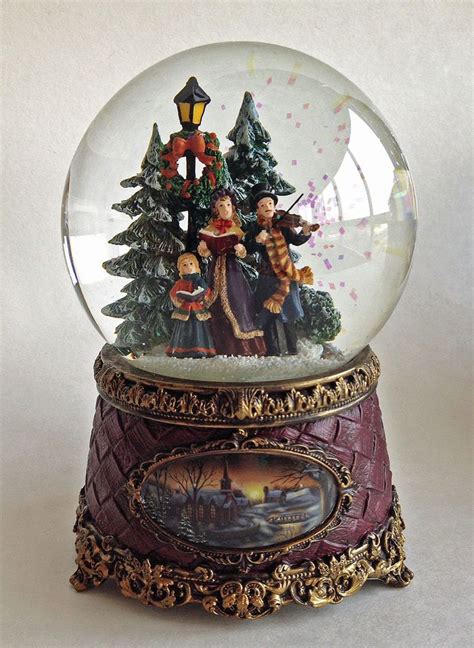 Festive Christmas Carolers Snow Globe