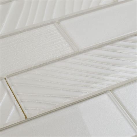 A background of vibrant yellow tiles framed by cream subway tiles is a guaranteed way to make a sunny statement in the bathroom. Glass Subway Tile Contemporary Almond 2x6 | Glass subway ...