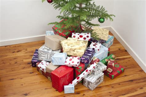 Free Stock Photo 8658 Pile Of Christmas Ts St The Base Of A Tree