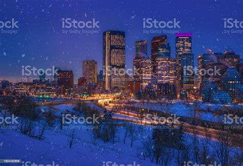 Downtown Calgary Skyline Glowing At Night Stock Photo Download Image